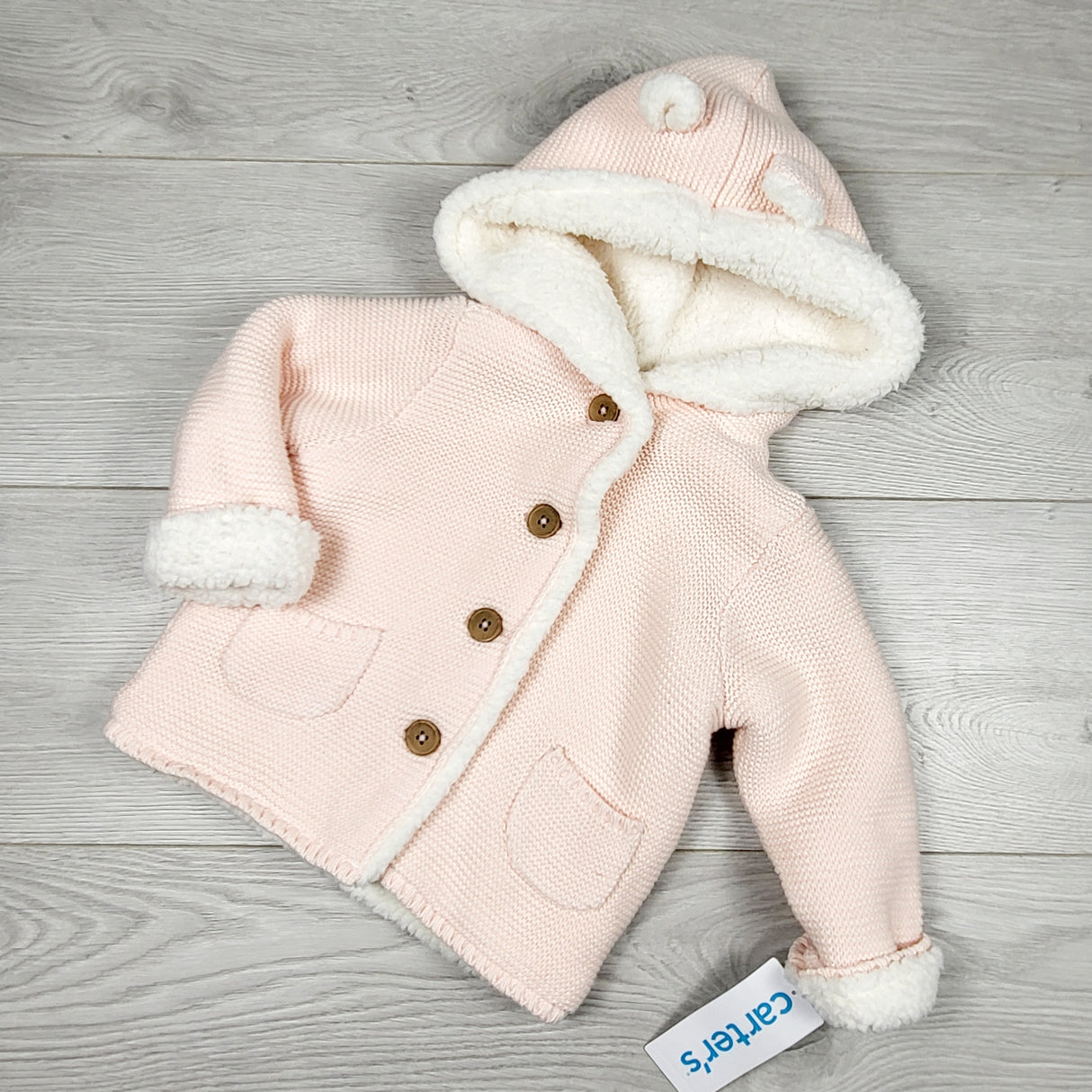 NEW - Carters pink hoded sweater with faux fur lining. Size 12 months
