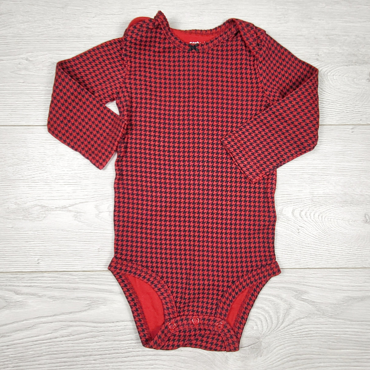 Carters red and navy houndstooth patterned bodysuit. Size 12 months