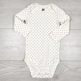 Carters cream coloured polka dot bodysuit. Size 12 months