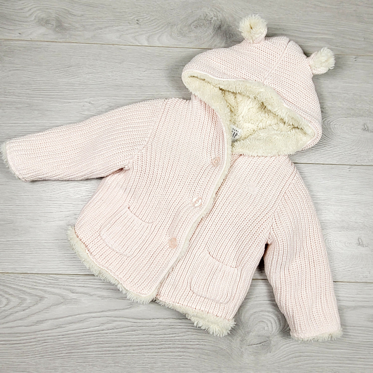Gap pink hooded sweater with faux fur lining. Size 6-12 months