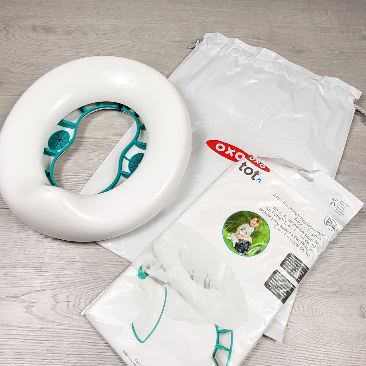 OXO Tot 2-in-1 Go Potty with replacement bags (sorry, no shipping)