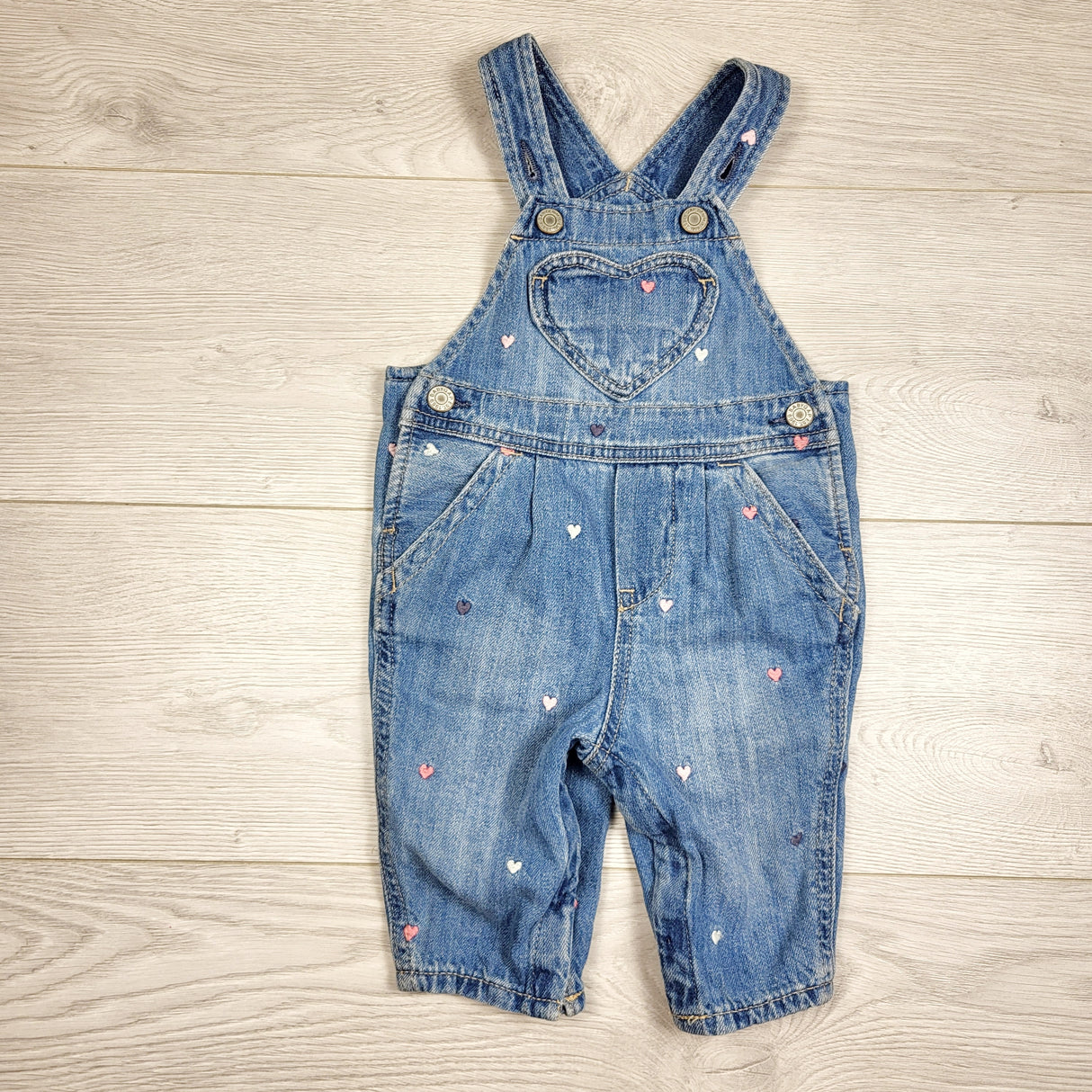 Gap denim overalls with embroidered hearts. Size 3-6 months