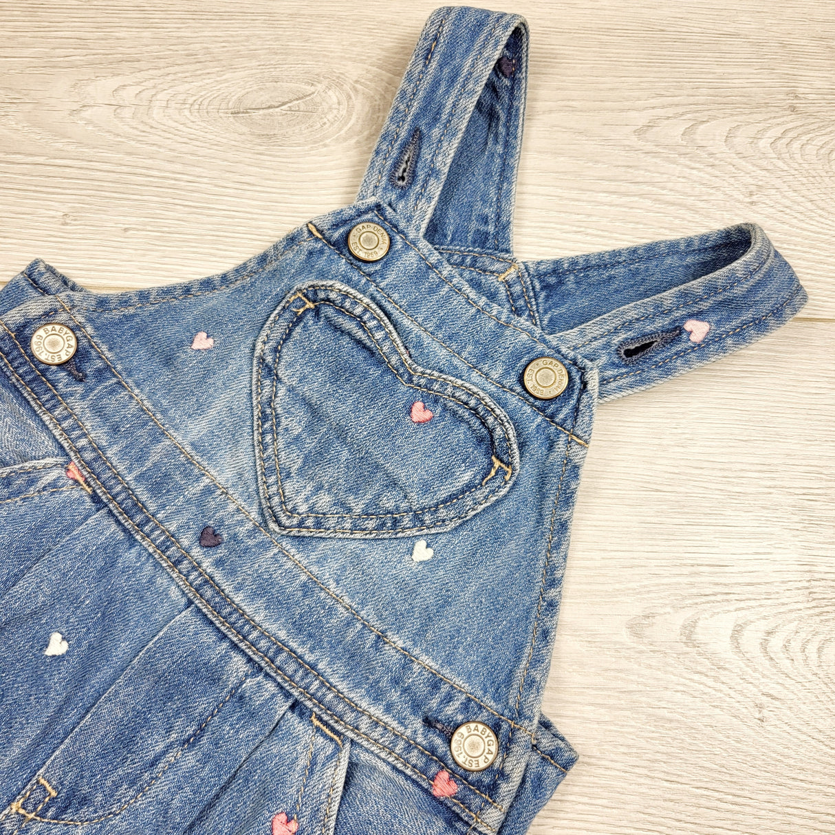 Gap denim overalls with embroidered hearts. Size 3-6 months