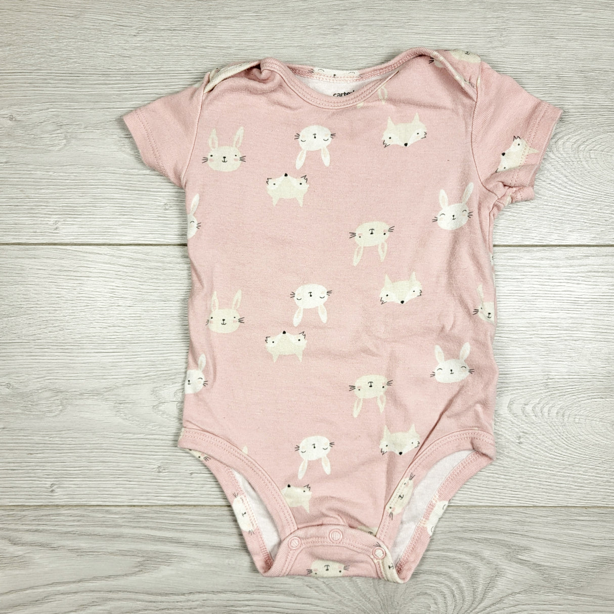 Carters pink bodysuit with woodland animals. Size 12 months