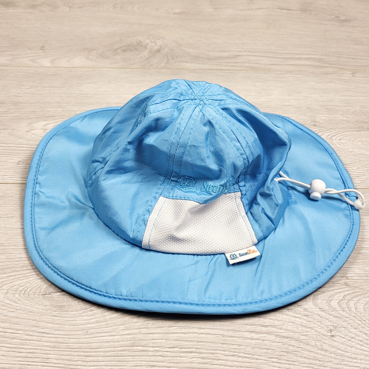 Swim Zip blue wide brim sun protection hat. Size 0-6 months