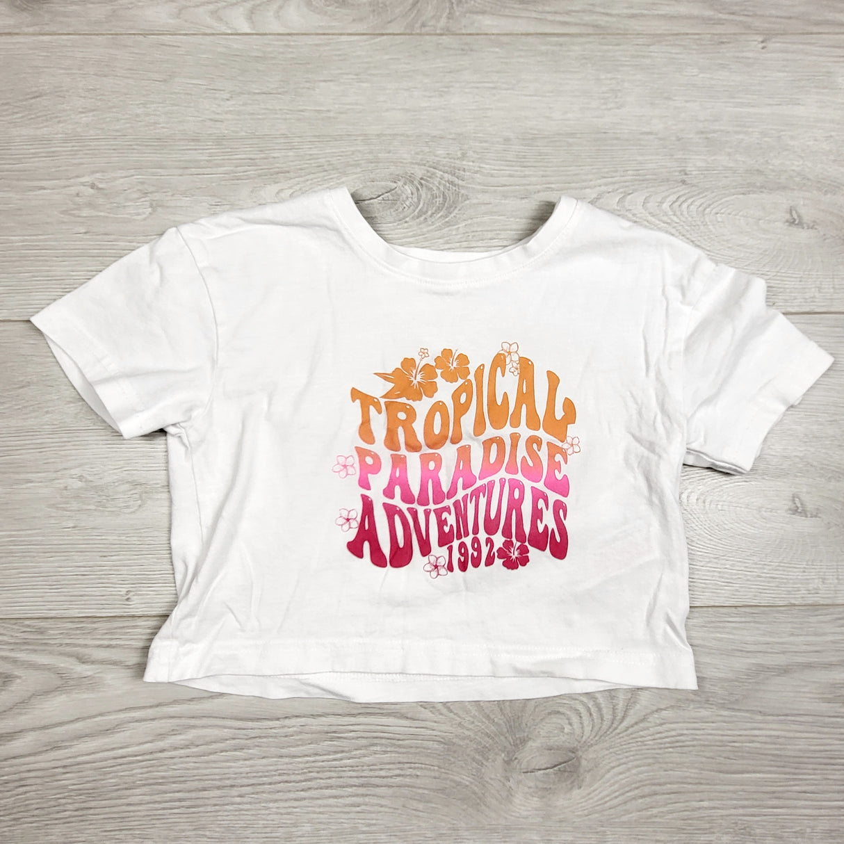 Primark white cropped "Tropical Paradise Adventures" t-shirt. Size 4/5T