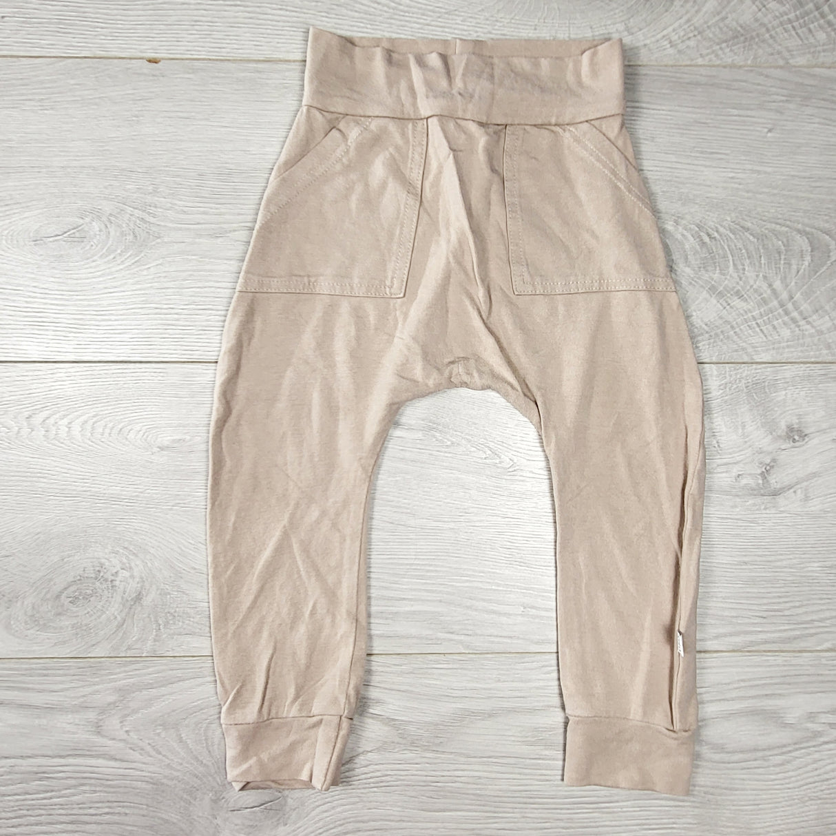 Tiny Button Apparel beige bamboo blend pants. Size 2/3T