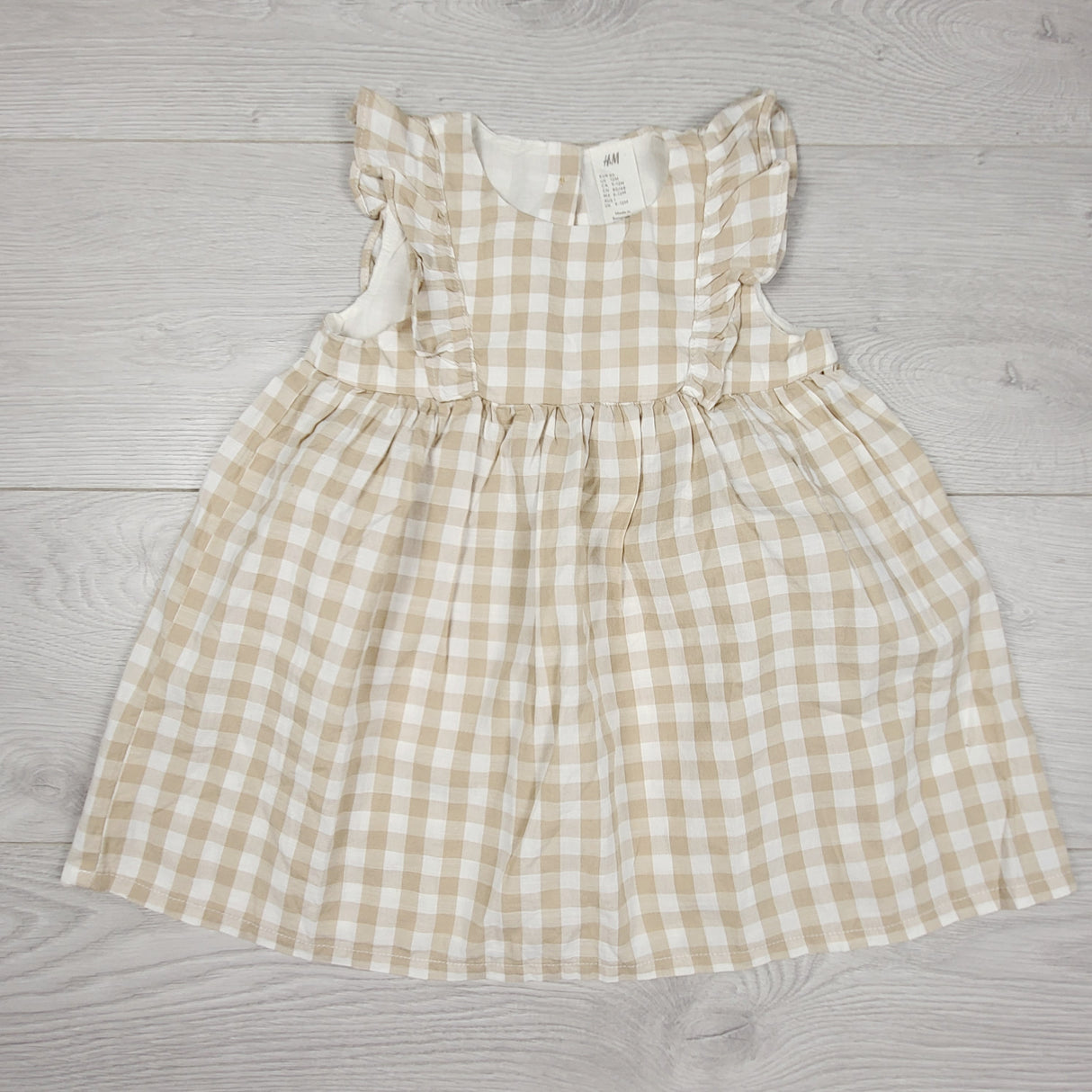 H and M beige checked dress. Size 9-12 months