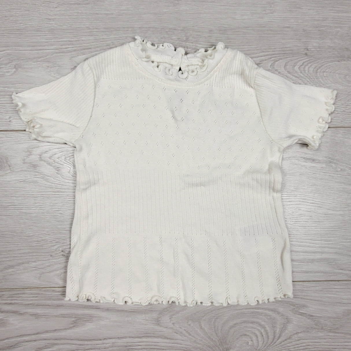 H and M cream coloured rib knit top. Size 6-9 months