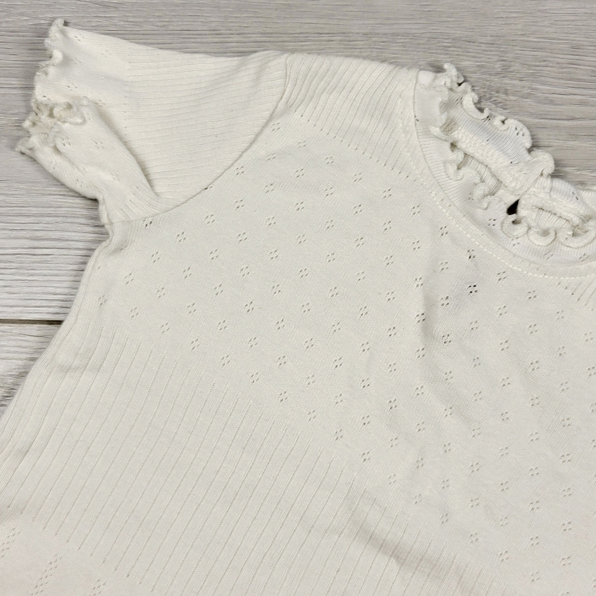 H and M cream coloured rib knit top. Size 6-9 months