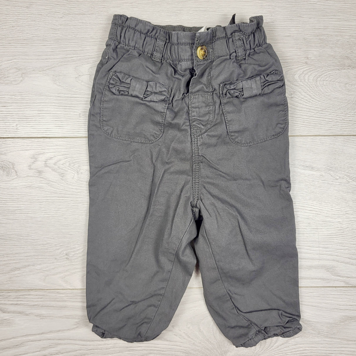 H and M grey pants with ruffle waist. Size 6-9 months