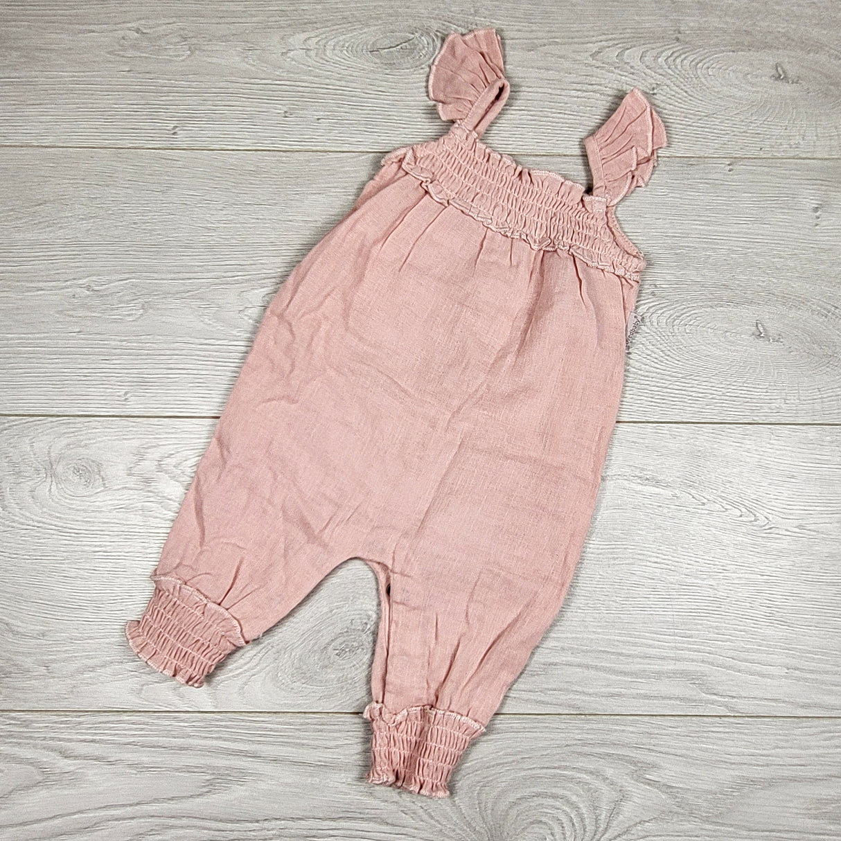 L'oved Baby pink smocked romper. Size 0-3 months
