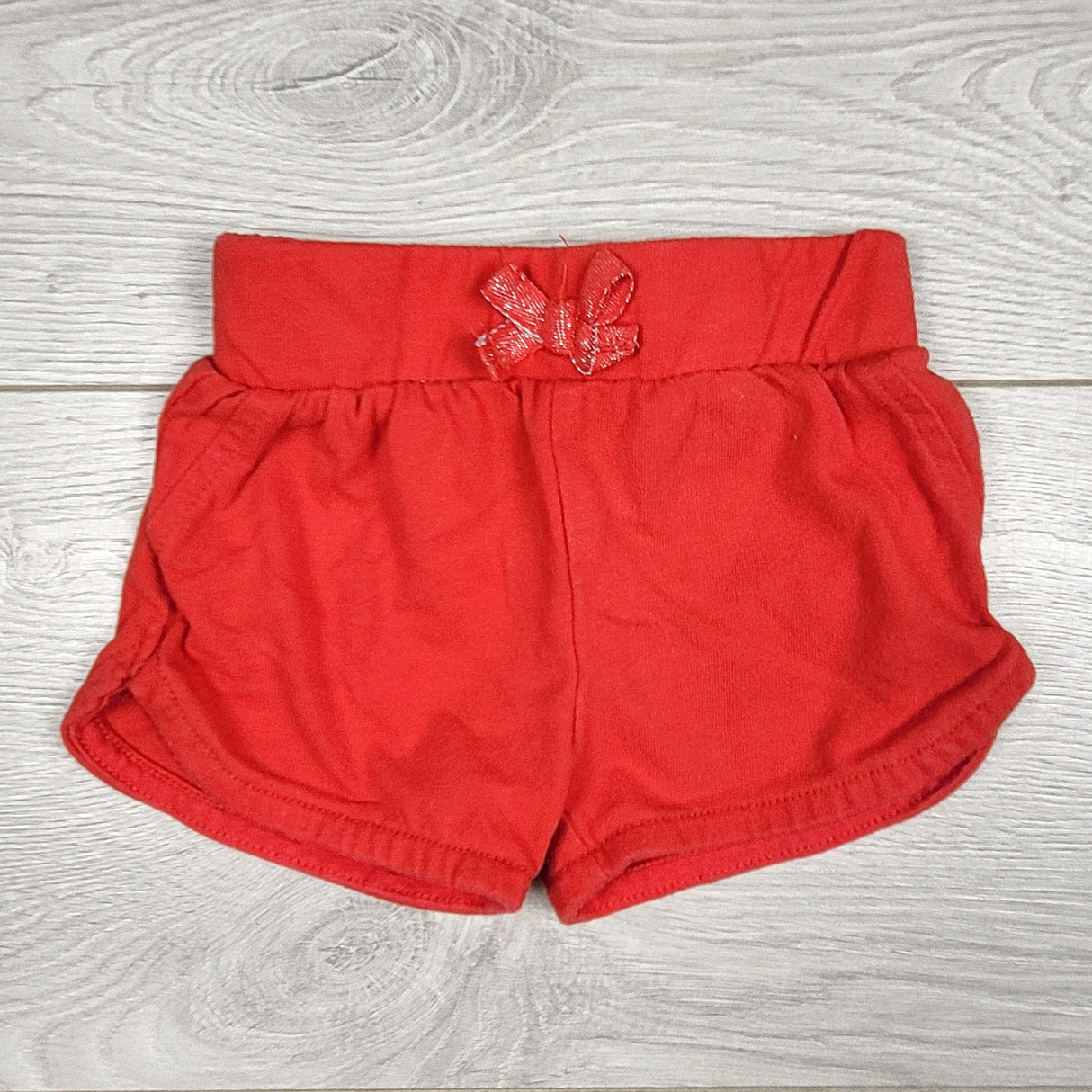 George red cotton shorts. Size 0-3 months