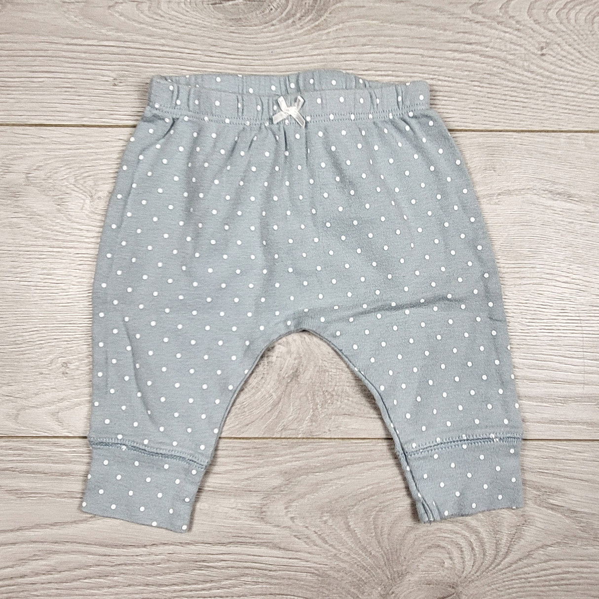 Carters aqua coloured polka dot leggings. Size 3 months