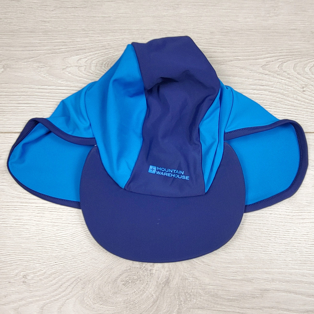 Mountain Warehouse blue and navy sun hat with ear and neck coverage. Infant sized