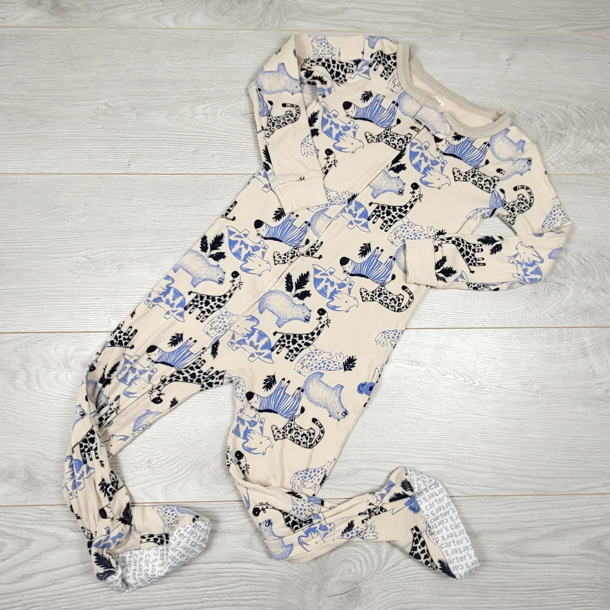 Carters beige zippered cotton sleeper with jungle animals. Size 3T