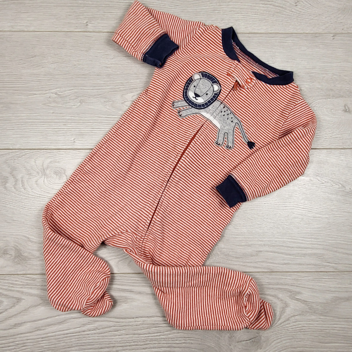 Carters red striped zippered cotton sleeper with lion. Size 9 months