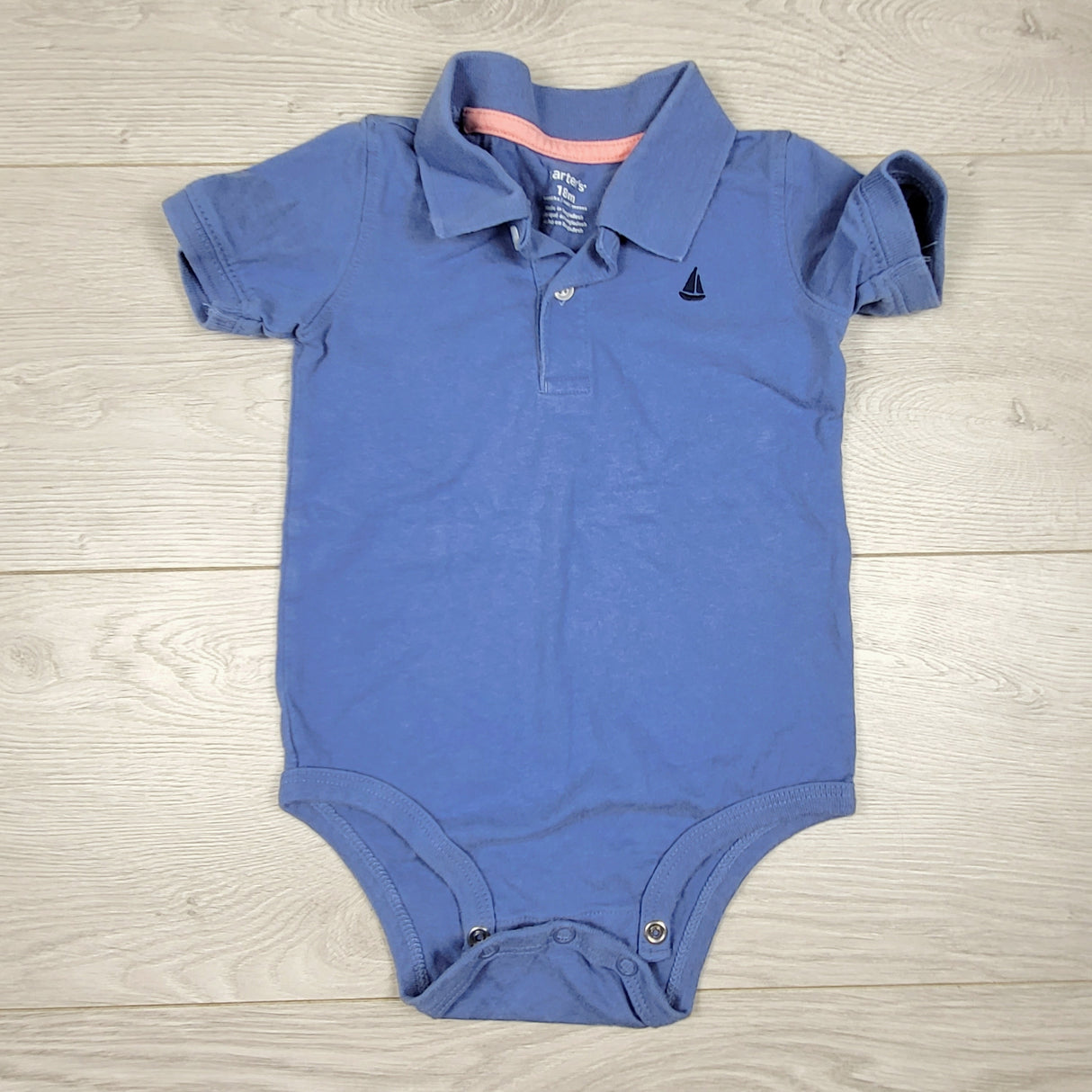 Carters blue collared polo style bodysuit. Size 18 months