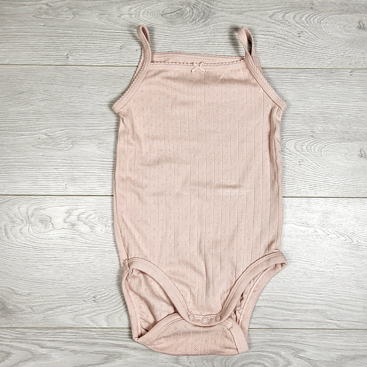H and M pink tank style bodysuit. Size 18-24 months