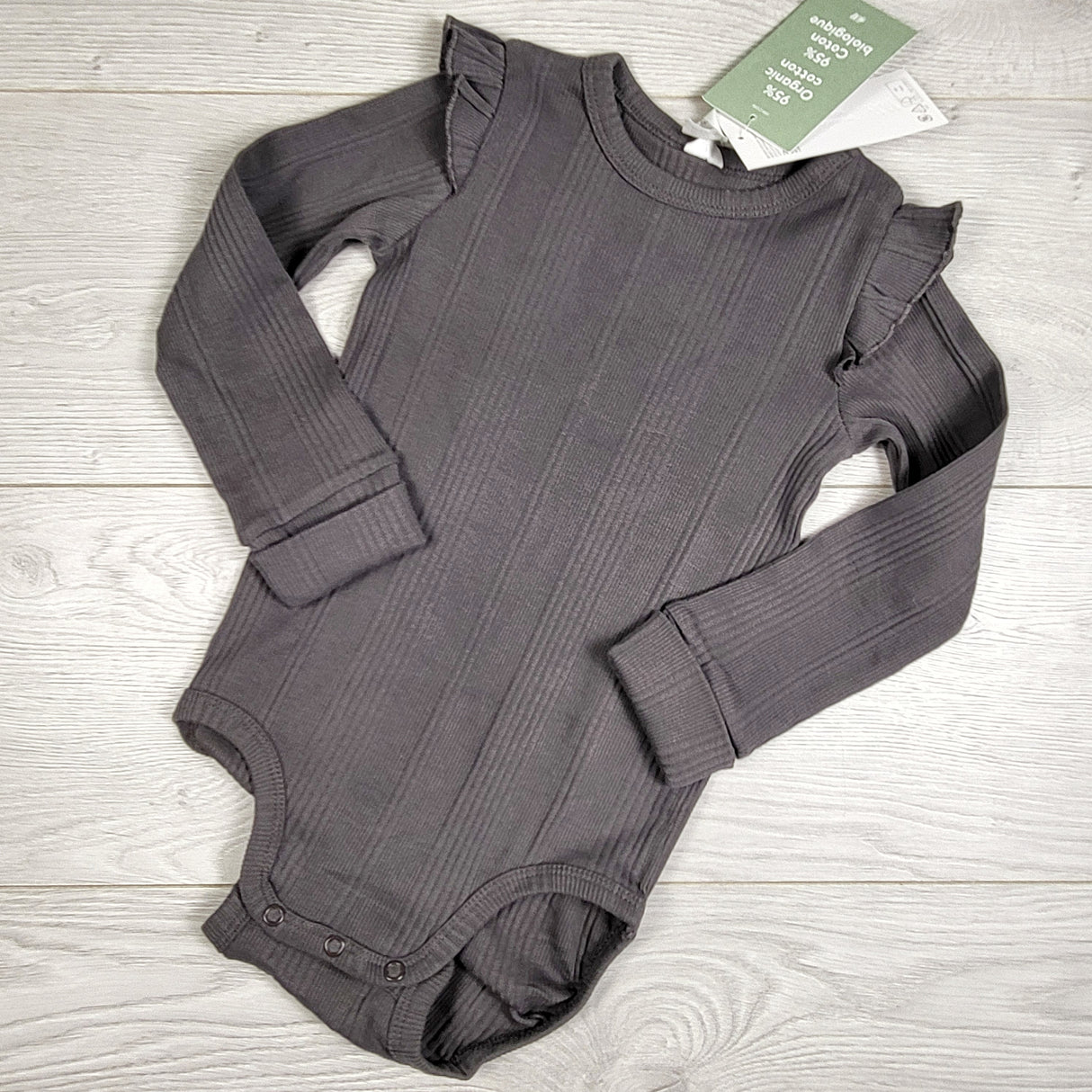 NEW - H and M dark grey rib knit bodysuit with ruffle. Size 18-24 months