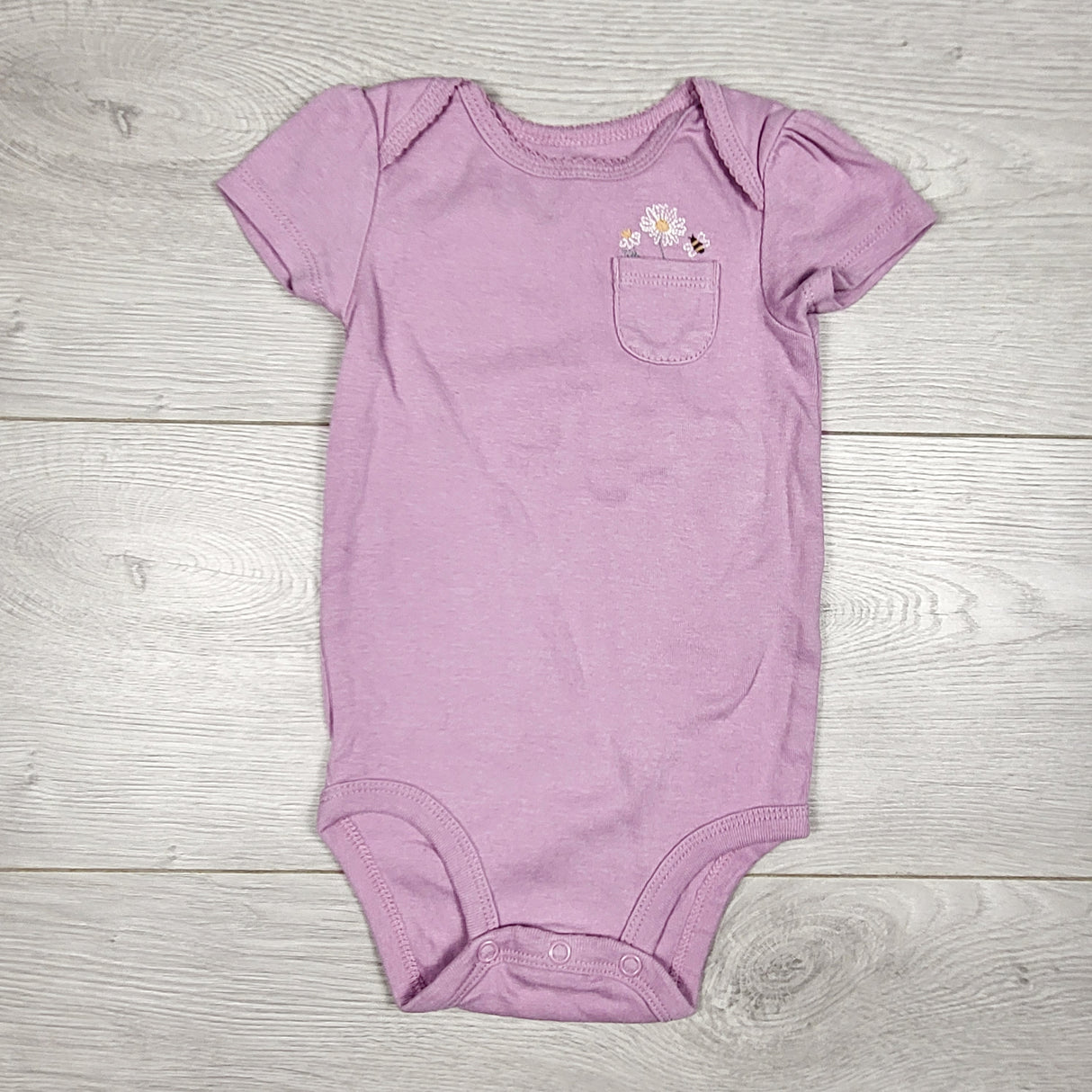Carters purple pocket bodysuit with embroidery. Size 6 months