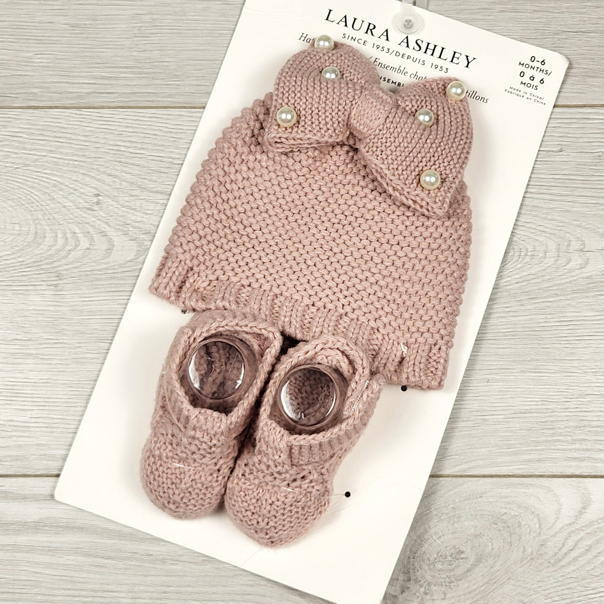 NEW - Laura Ashley hat and bootie set. Size 0-6 months