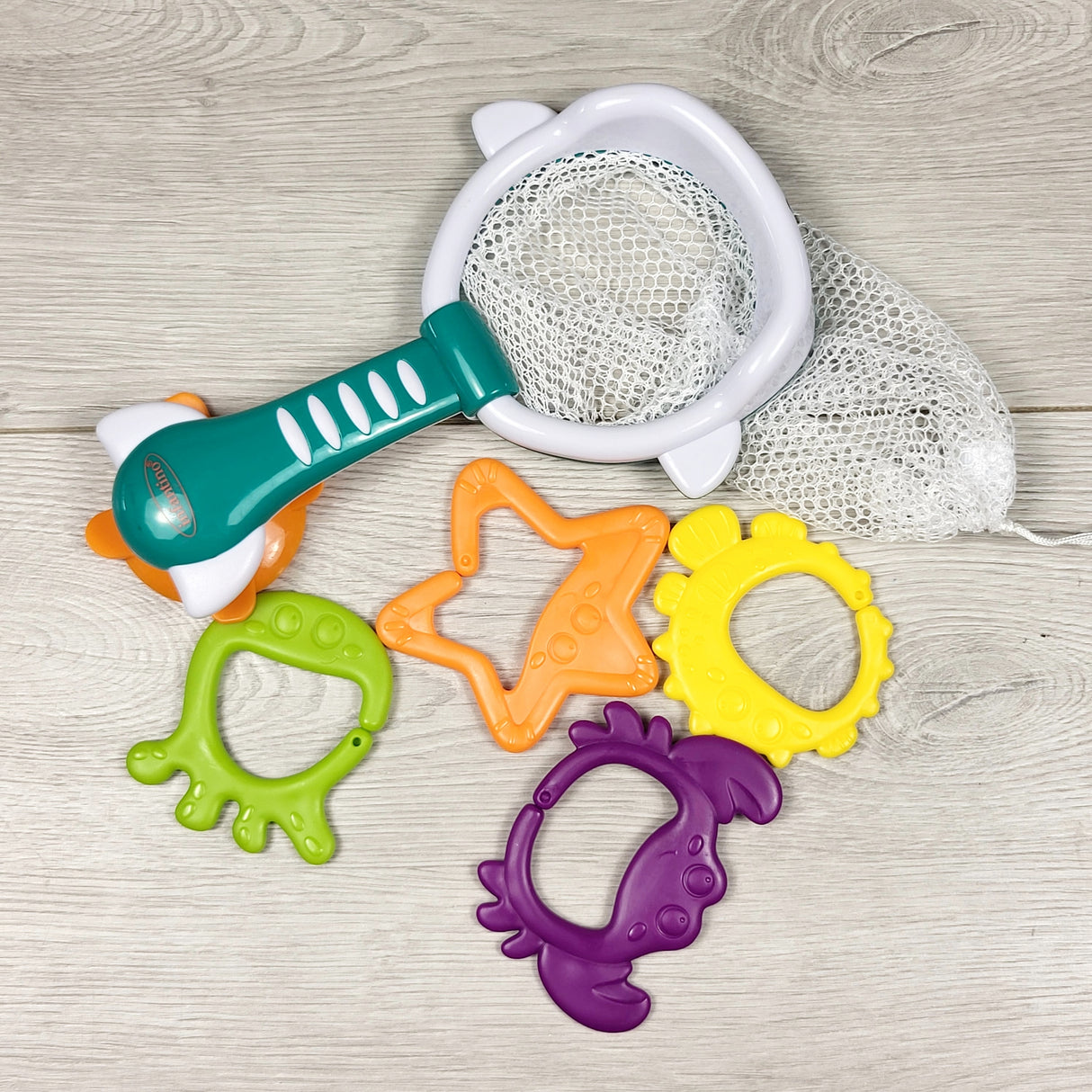 Infantino Scoop 'N Splash Ocean Links bath toy set.