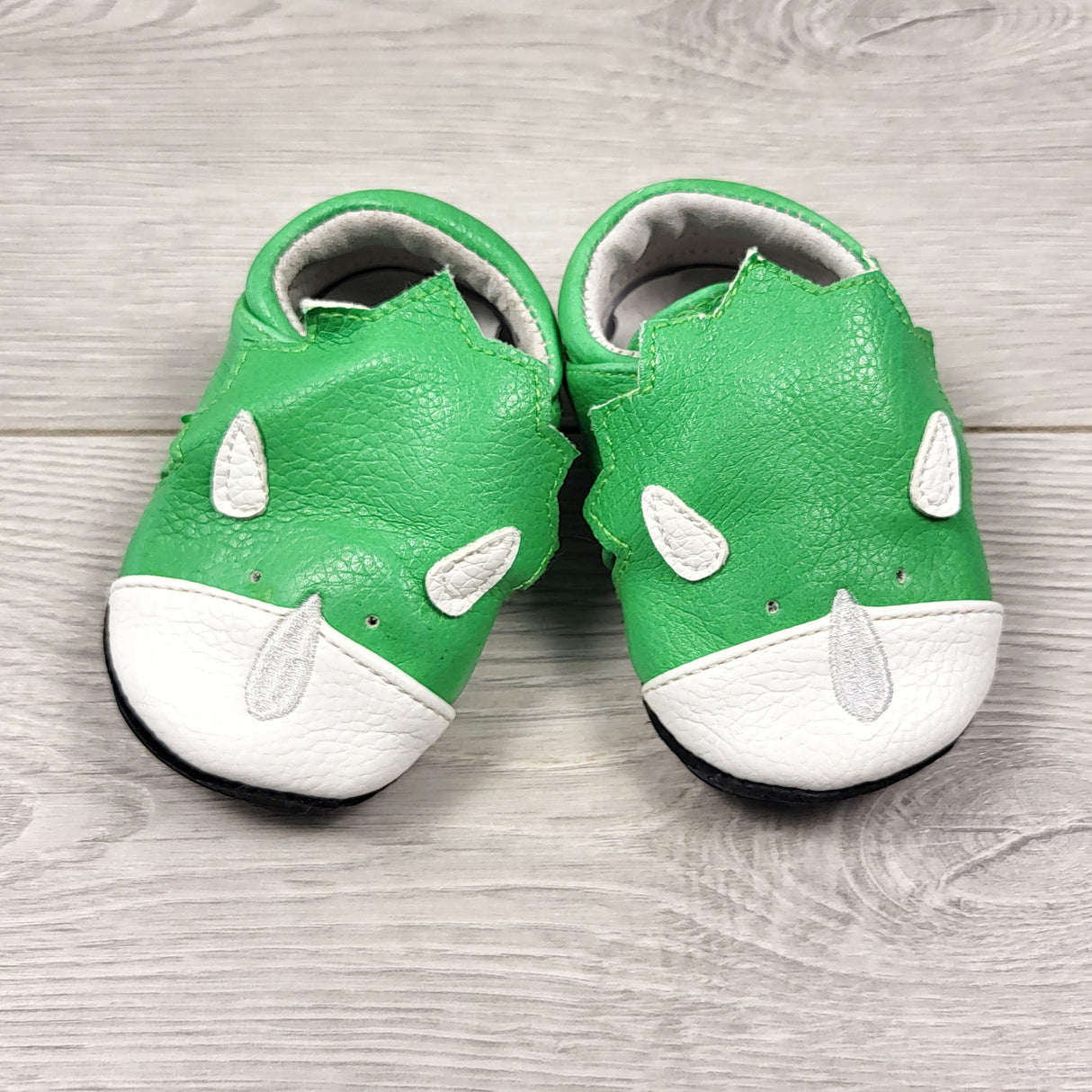 Jack and Lily green and white leather rhino shoes. Size 0-6 months