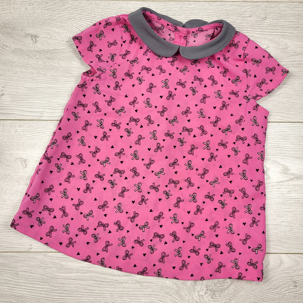 Motherease pink collared chiffon top with bows. Size 2/3T