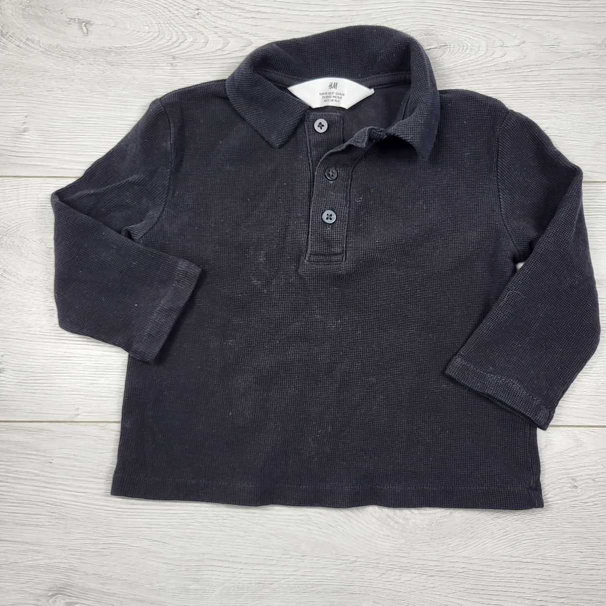 H and M black long sleeve polo shirt. Size 18-24 months