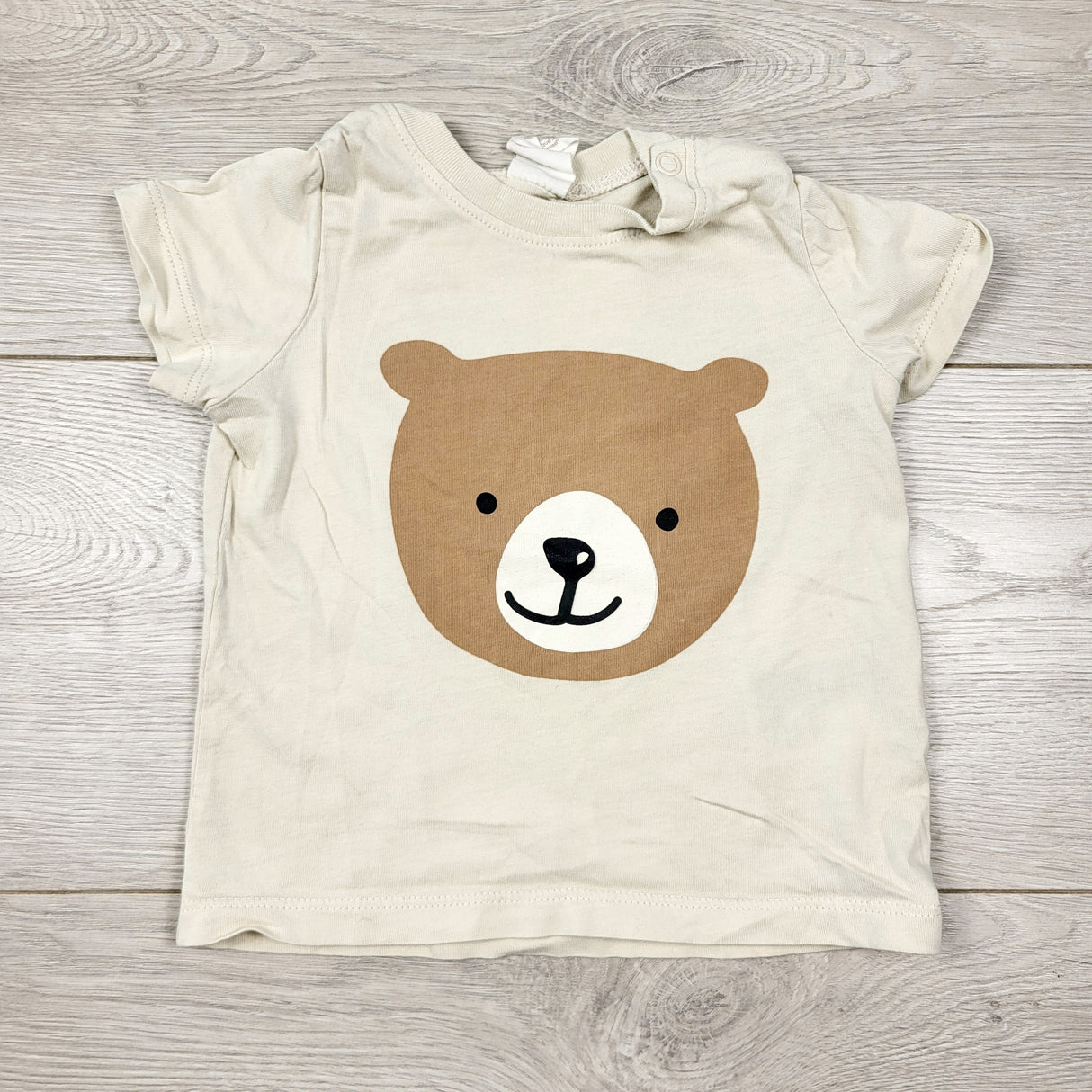 H and M beige t-shirt with bear. Size 4-6 months