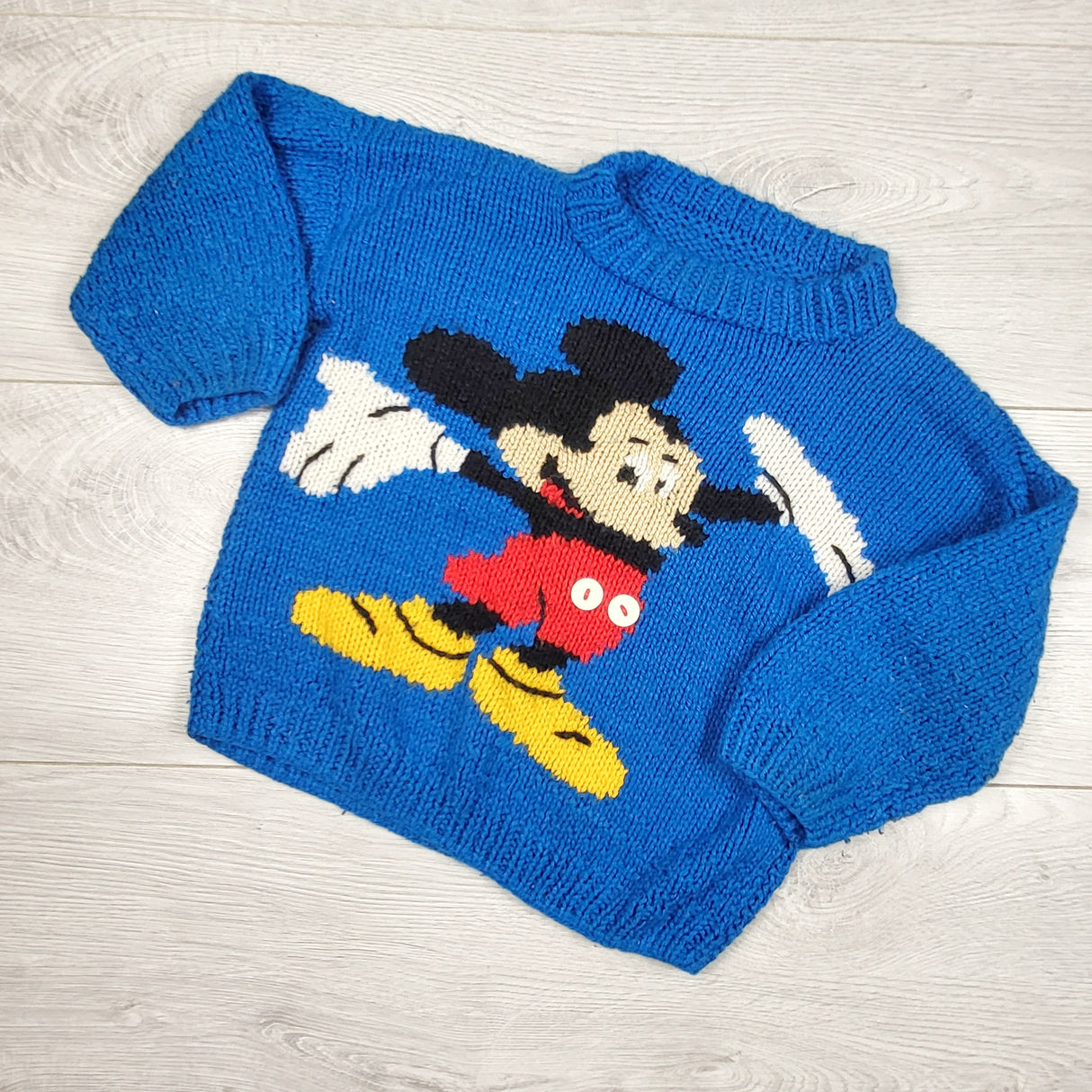 Blue handmade Mickey Mouse sweater. Sizes like a 3T