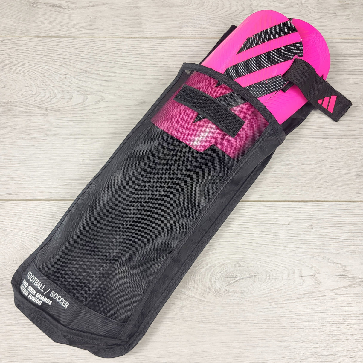 Adidas pink football / soccer shin guards. Youth size large