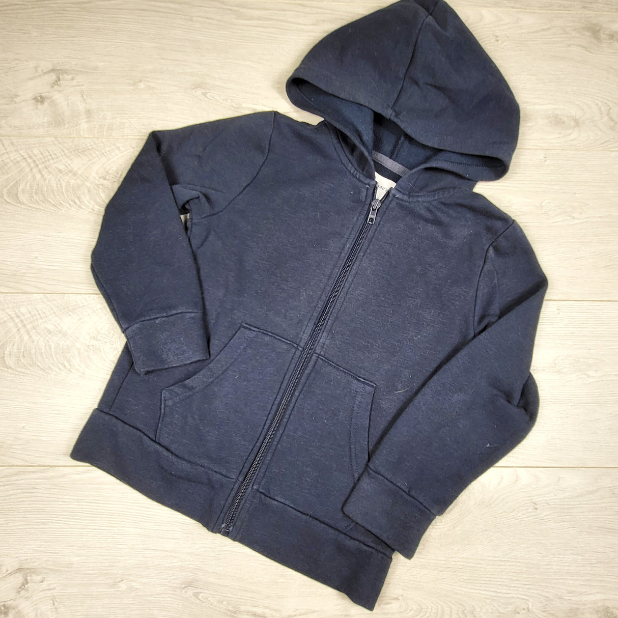 Old Navy navy zip up hoodie. Size 6/7