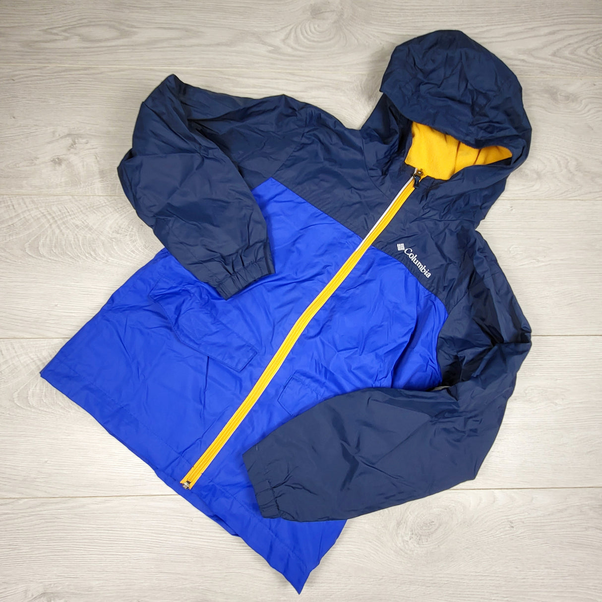 Columbia navy and blue hooded rain coat. Size 8