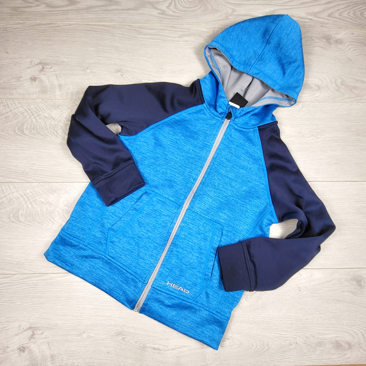 Head blue and navy fleecy lined zip up hoodie. Size small (6/7ish)
