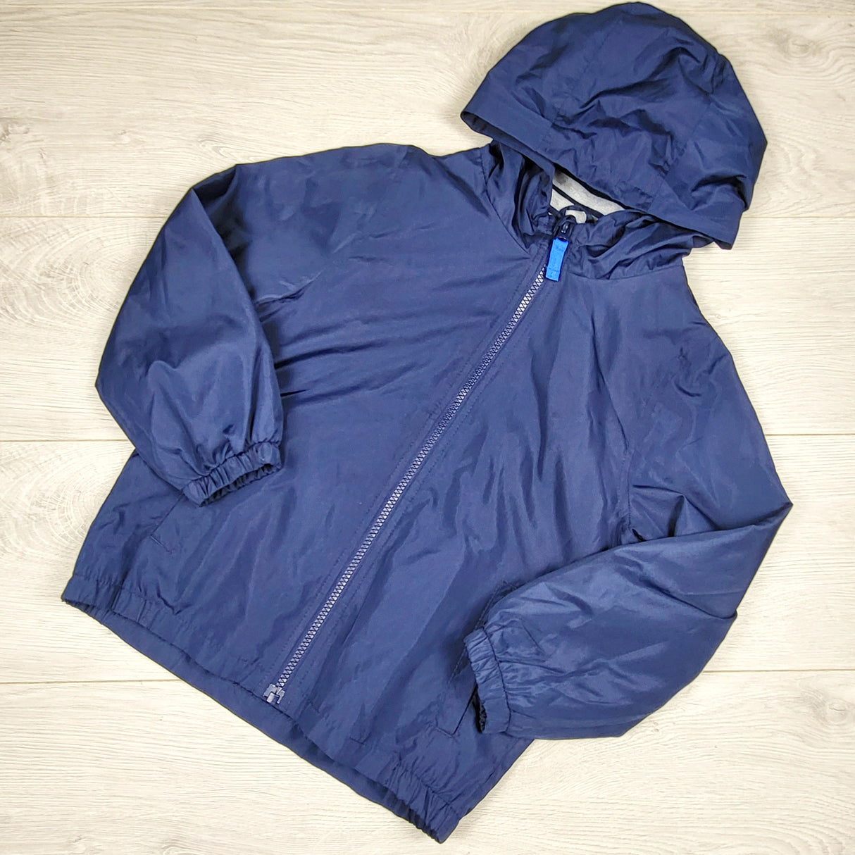 Carters navy hooded windbreaker. Size 6