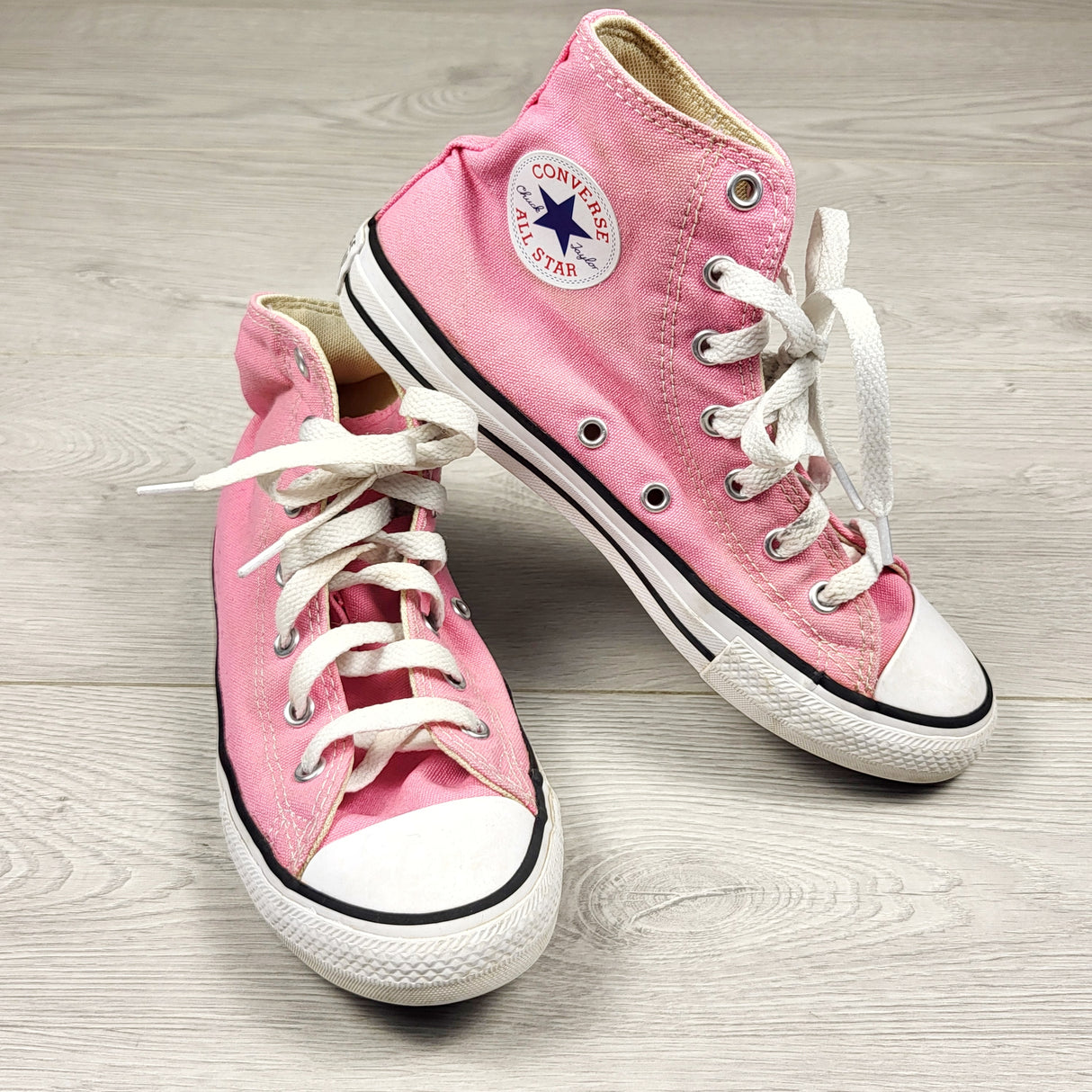 Converse pink canvas high top shoes. Youth size 3