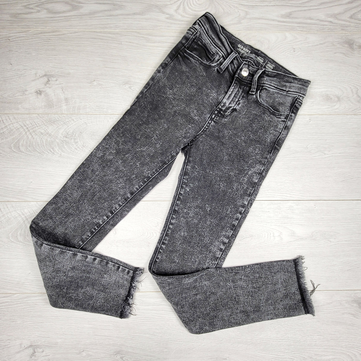 Old Navy black acid wash rockstar jeggings. Size 10