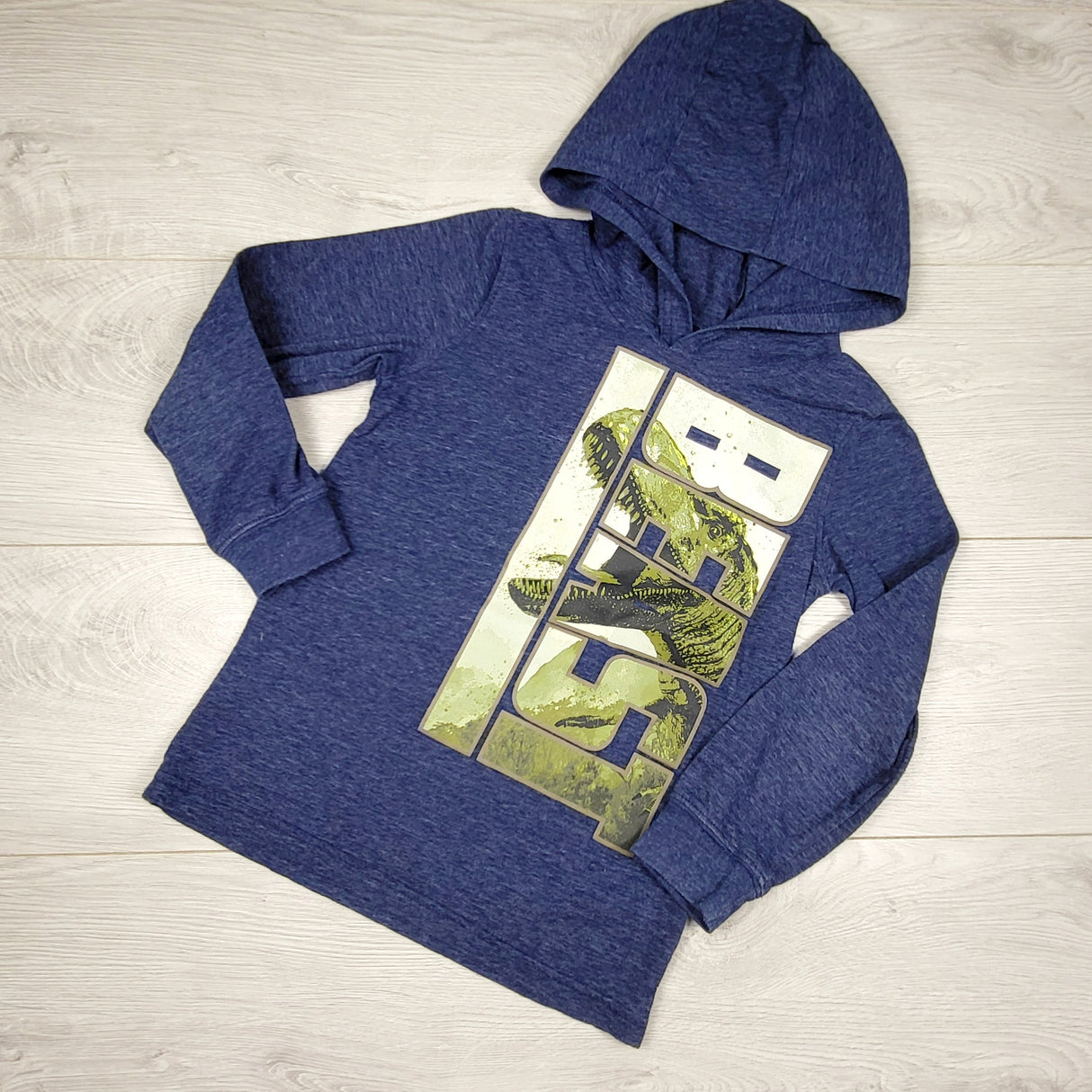 Carters blue hooded top with dinosaurs. Size 6