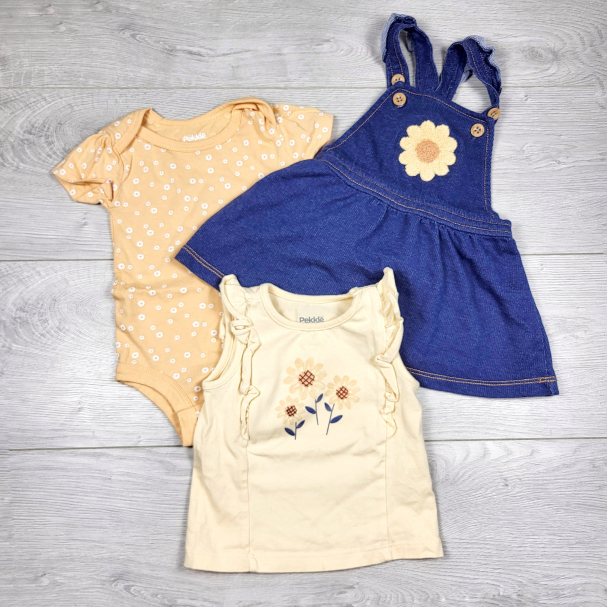Pekkle 2pc set with sunflowers. Size 6 months