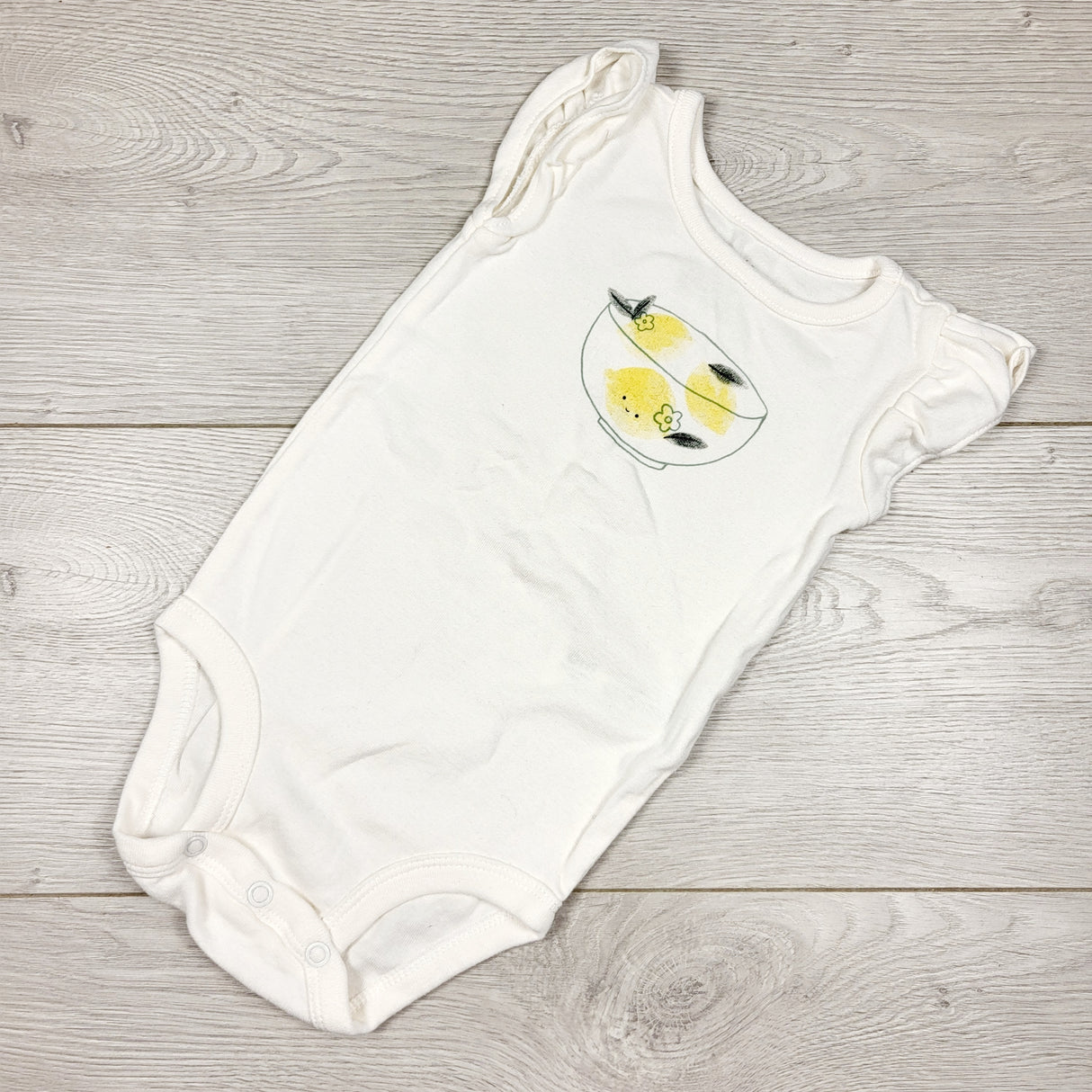 Carters white bodysuit with lemons. Size 6 months