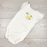 Carters white bodysuit with lemons. Size 6 months