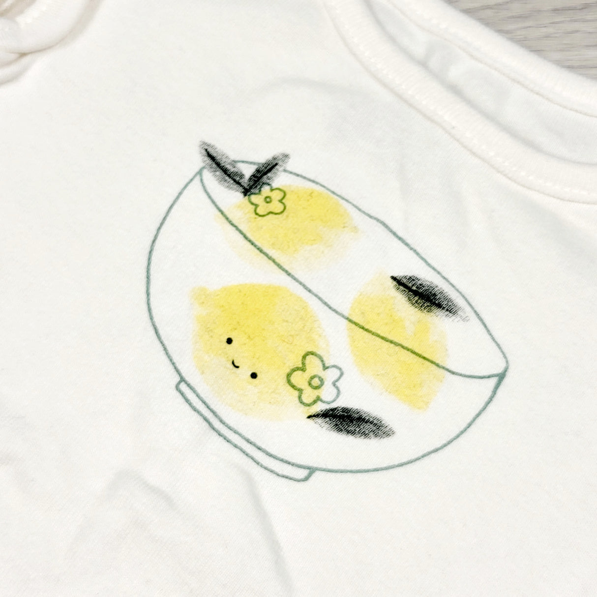 Carters white bodysuit with lemons. Size 6 months