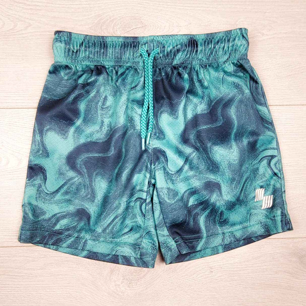 Old Navy teal and navy swirl pattern active shorts. Size 4T