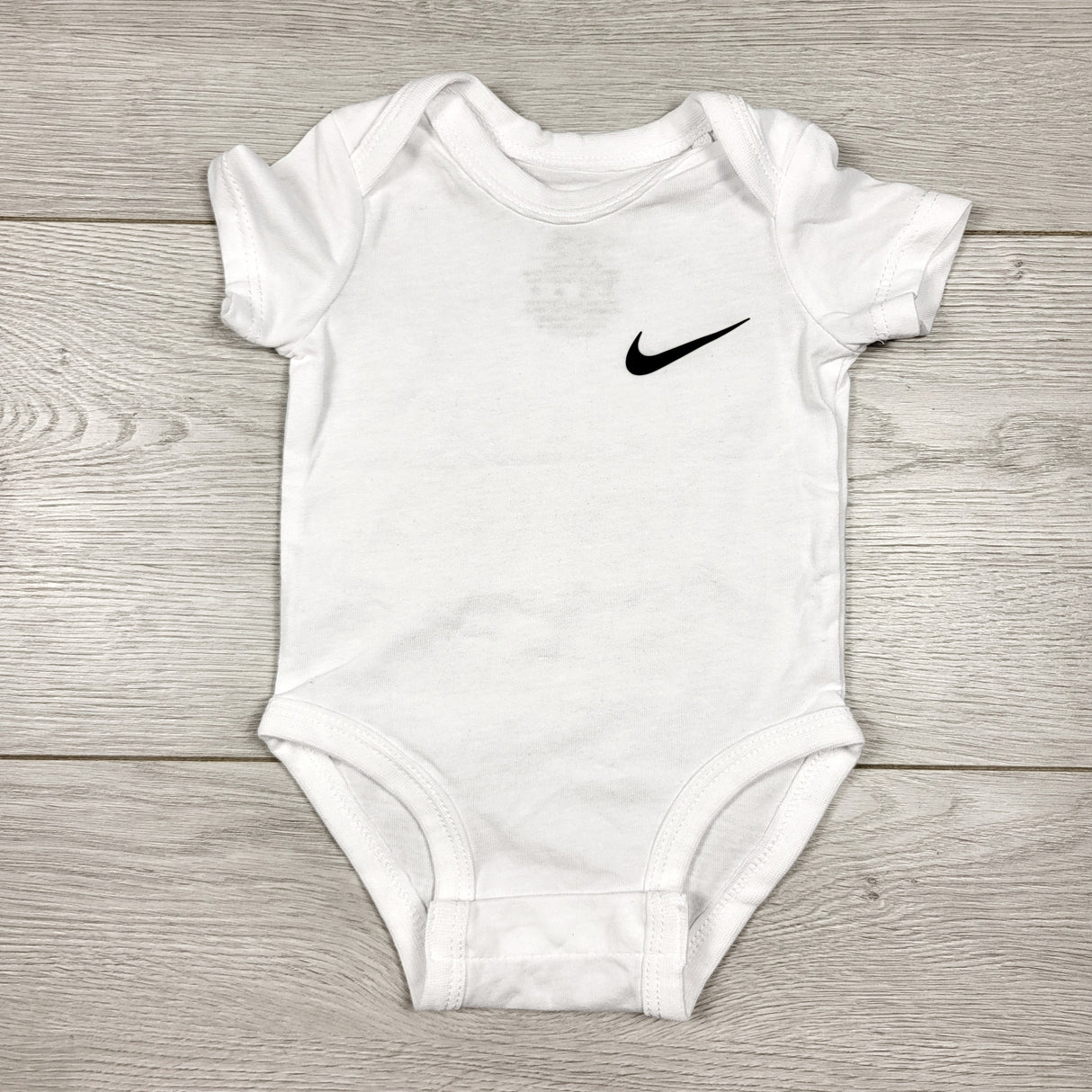 Nike white bodysuit. Newborn size