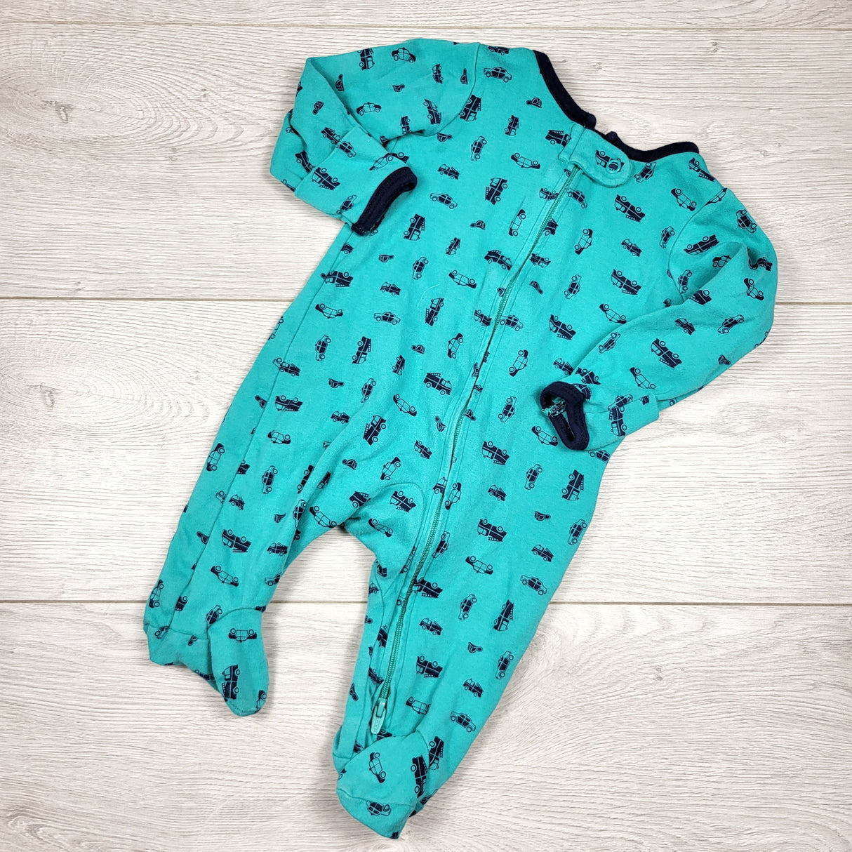 Simple Joys teal zippered cotton sleeper with fire trucks. Size 0-3 months