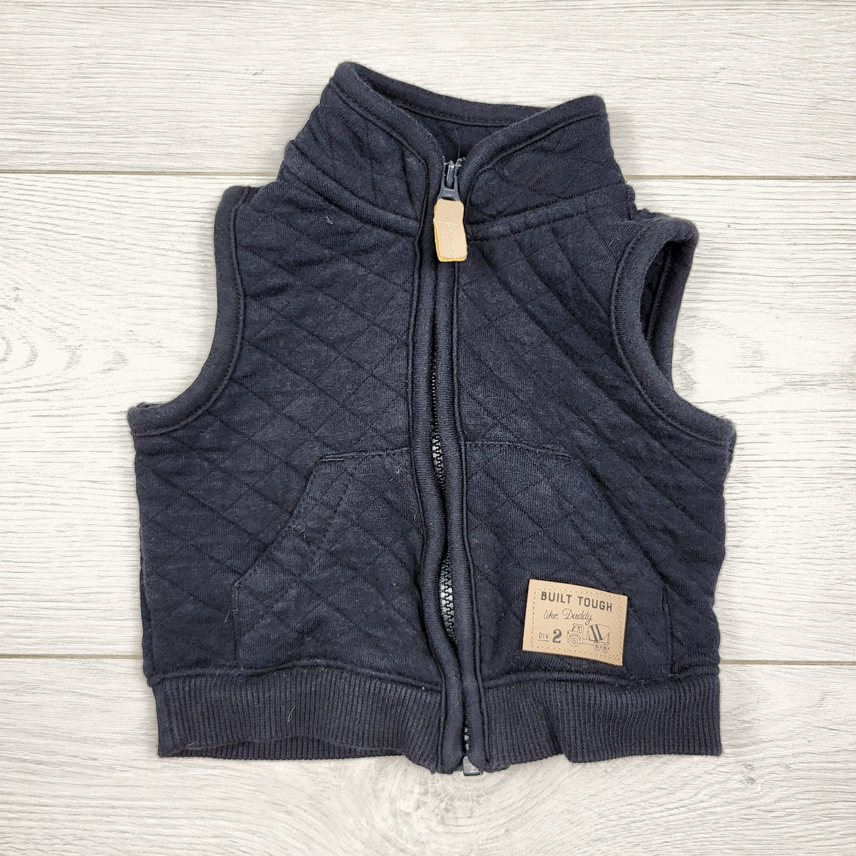 Carters black quilted cotton vest. Newborn size