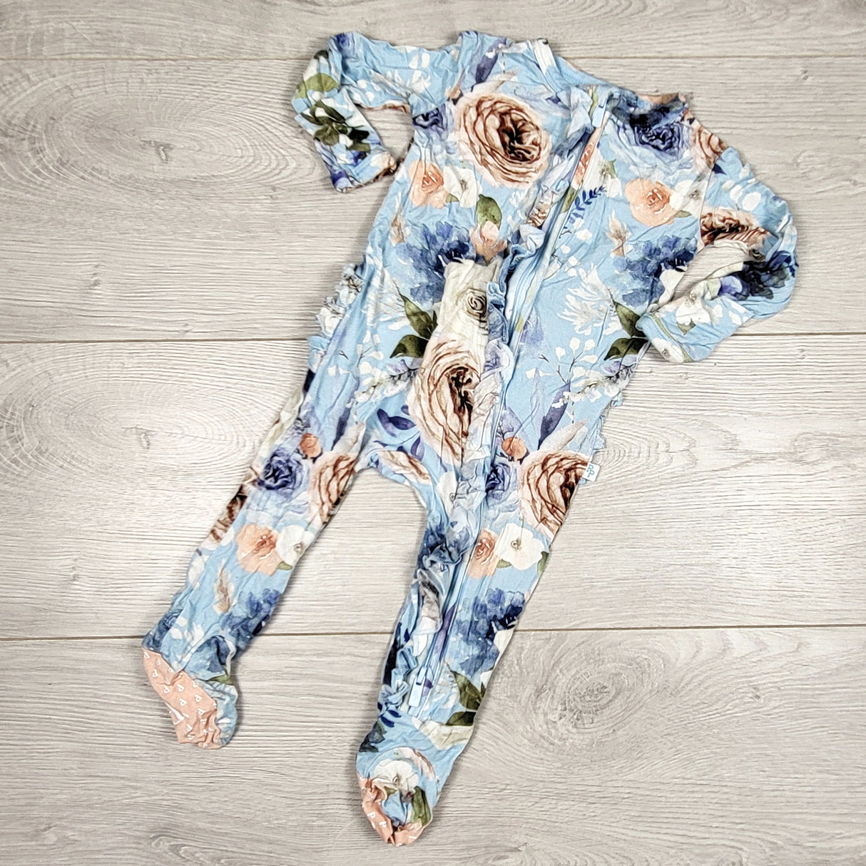 Posh Peanut blue floral print bamboo sleeper. Size 0-3 months