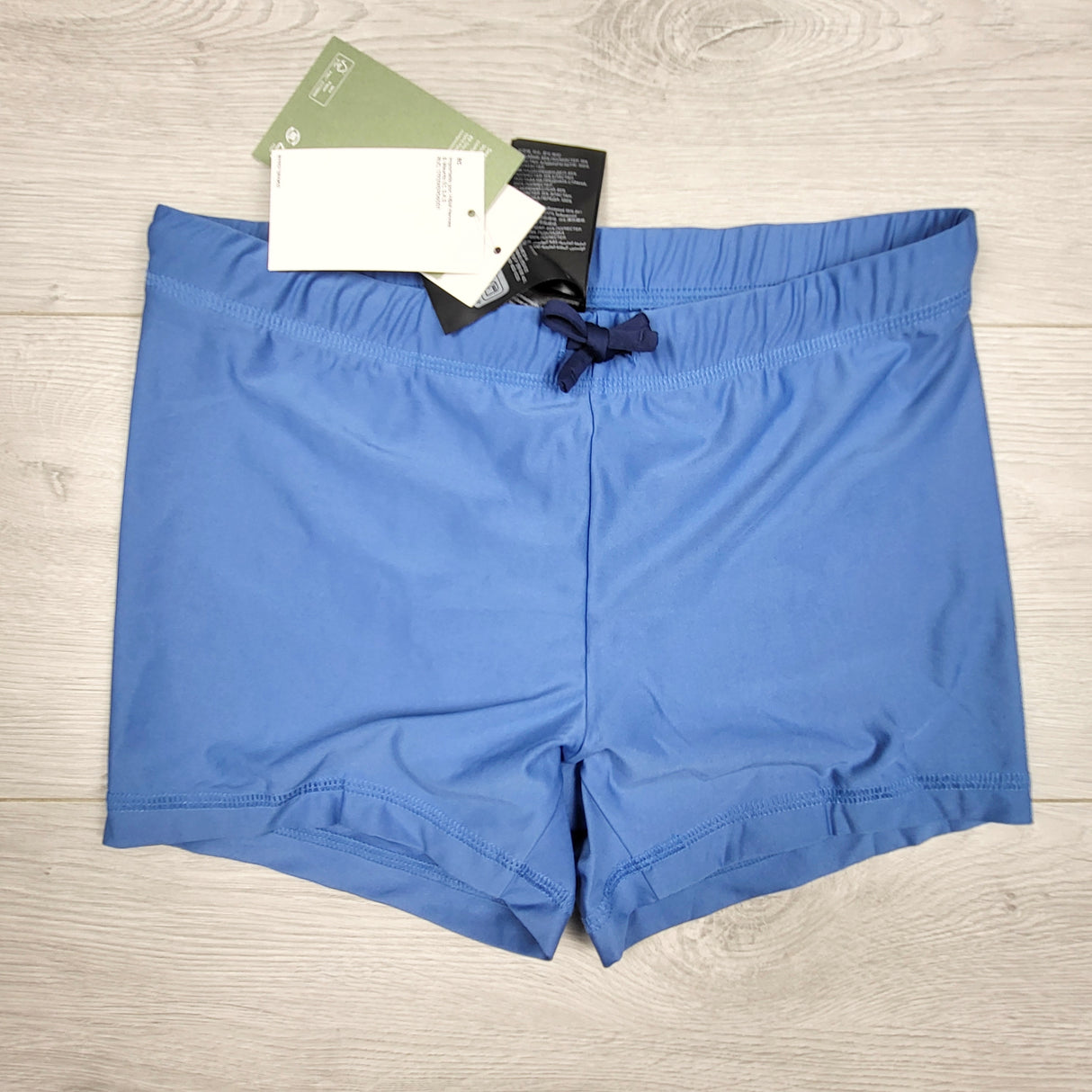 NEW - H and M blue slim fit swim shorts. Size 10/12